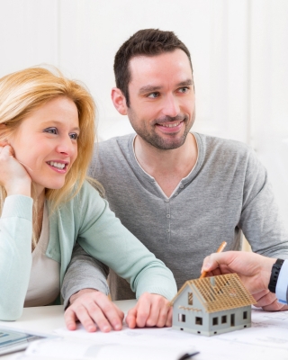 Couple Listening to Realtor